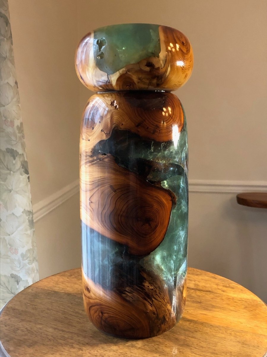 a vase made from stabilized wood using resin and a wood turning process using a lathe